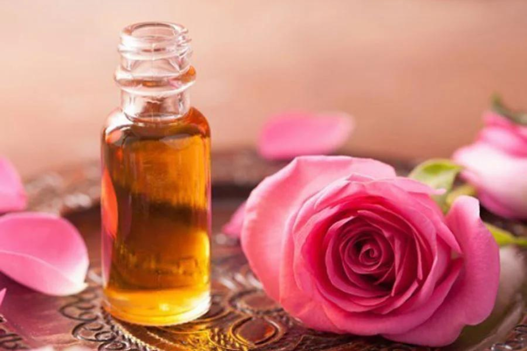 Gulab essential oil in a glass bottle