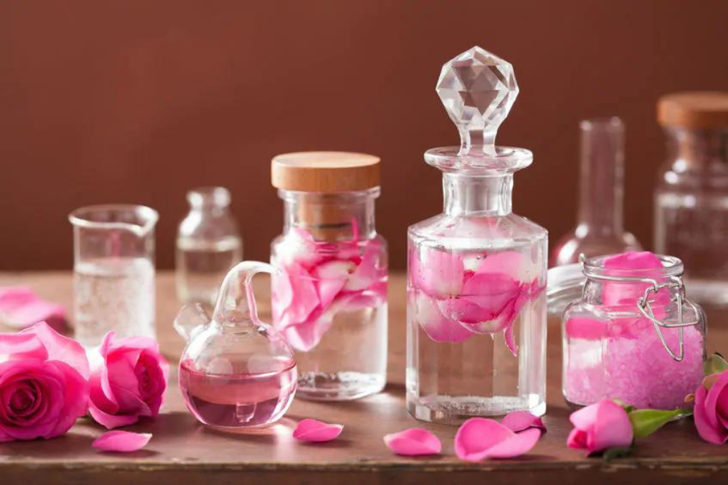 rose water in different sizes of glass bottles